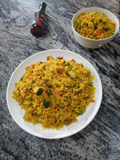 A picture of Orange flavored carrot rice.