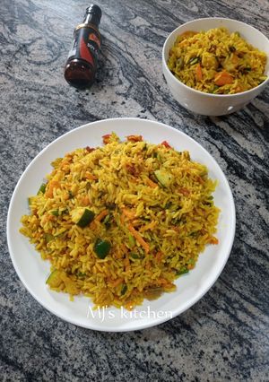 A picture of Orange flavored carrot rice.