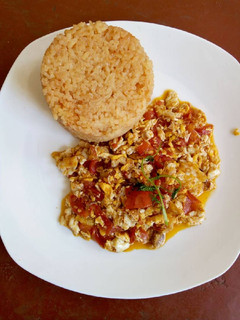A picture of Fried Eggs with Tumeric Rice.