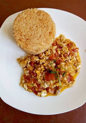 A picture of Fried Eggs with Tumeric Rice.