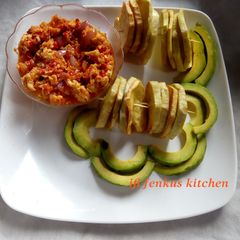 A picture of Fried sweet potatoes and egg sauce.