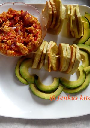 A picture of Fried sweet potatoes and egg sauce.