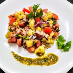 A picture of Salad with chutney.