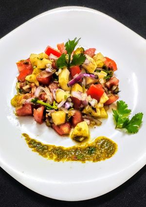 A picture of Salad with chutney.