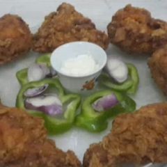 A picture of Saudi Broasted Chicken.