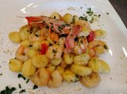 Una foto di gnocchi pesce