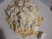A picture of pasta with olives