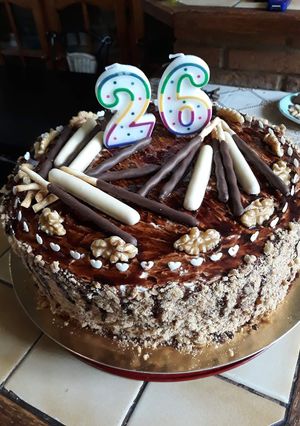 O poză a rețetei Tort cu blat de cacao și cremă de ciocolată.