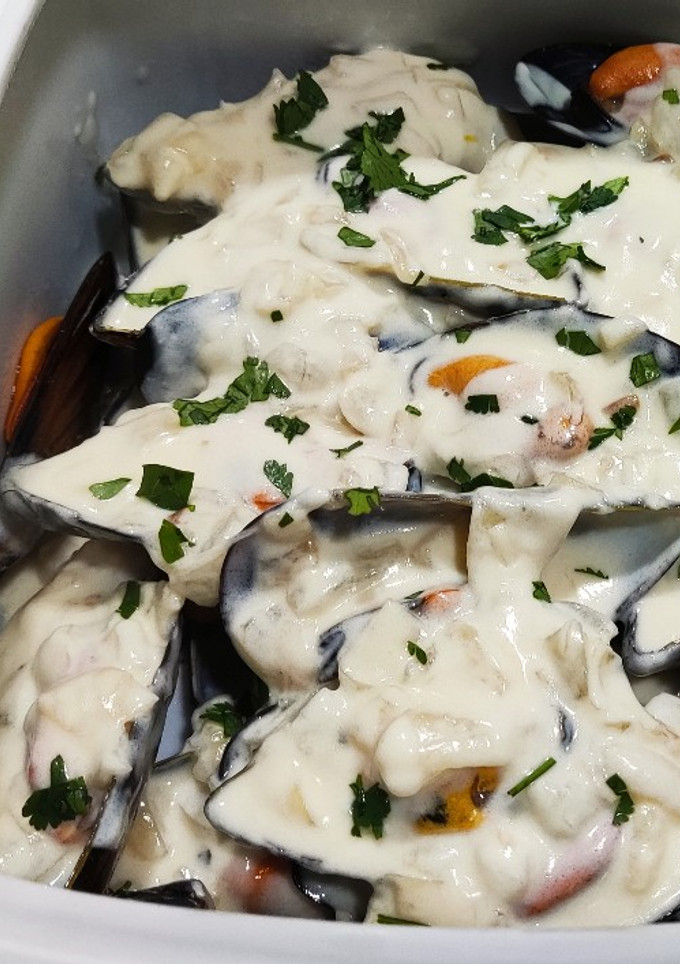 Una foto de Mejillones con salsa al cava