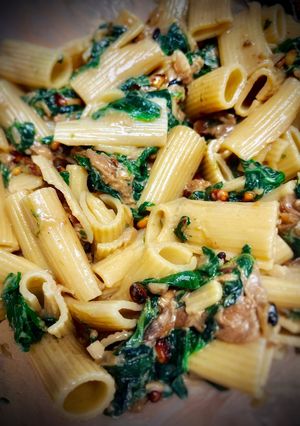 A picture of Rigatoni with Cabrales Sauce, Spinach, and Mushrooms.