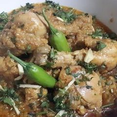 A picture of Chicken Dumpukht in Pressure cooker.