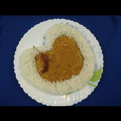A picture of Dal Fry with Rice.