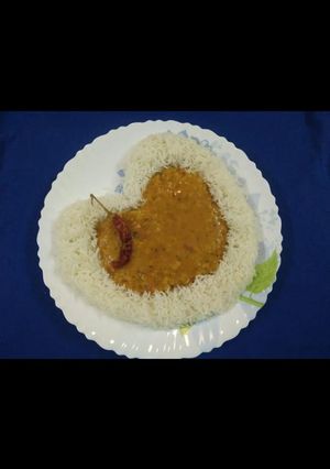 A picture of Dal Fry with Rice.