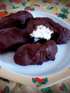 Foto di Dolcetti al cocco ricoperti di cioccolato