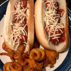 A picture of Curly Fries and Turkey Meatball Subs.