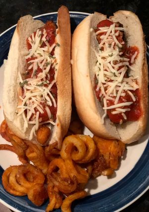 A picture of Curly Fries and Turkey Meatball Subs.