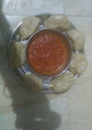 A picture of Soya Momos with chutni.