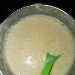 A picture of Rice,egg Yolk and carrot puree.