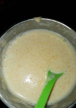 A picture of Rice,egg Yolk and carrot puree.