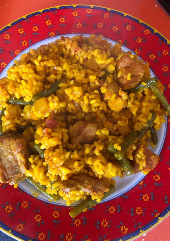Una foto de Arroz con calabaza y costillejas
