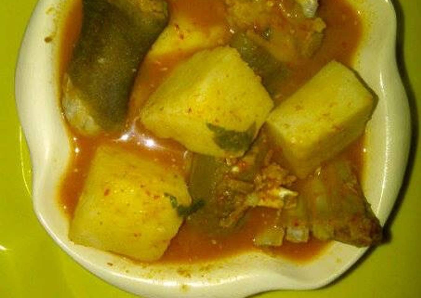 Yam and goat meat tomato peppersoup