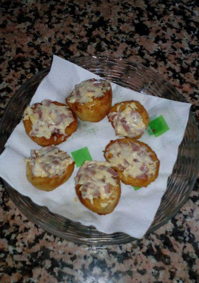 Una foto de Huevos rellenos y rebozados