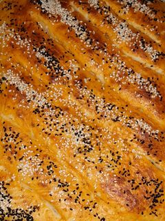 صورة لوصفة فطيرة بحشوة البيتزا 😋😋