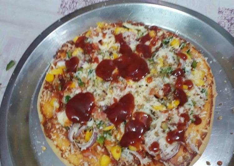 माइक्रोवेव में पिज़्ज़ा (Microwave mein pizza recipe in hindi) रेसिपी बनाने की विधि in Hindi by Nidhi Amit Jain - Cookpad