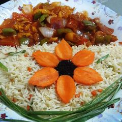 Chicken shashlik with fried rice A picture of Chicken shashlik with fried rice.