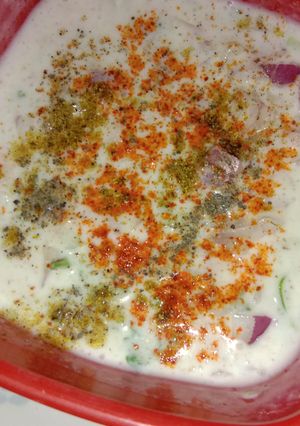 A picture of Onion cucumber Raita.