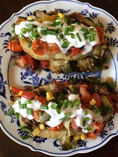 A picture of California Farm Beef Stuffed Potato Skins on Latkes.