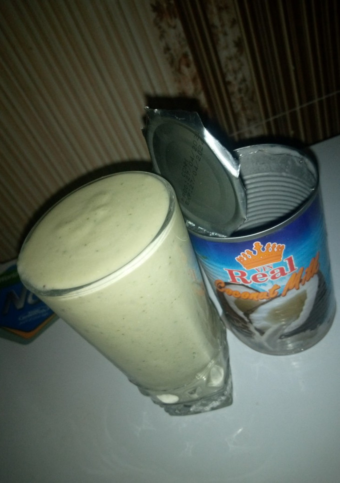 A picture of Cucumber smoothie 🍌 🥒 🥥.