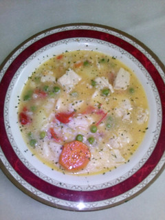 Una foto de Arroz caldoso con pollo