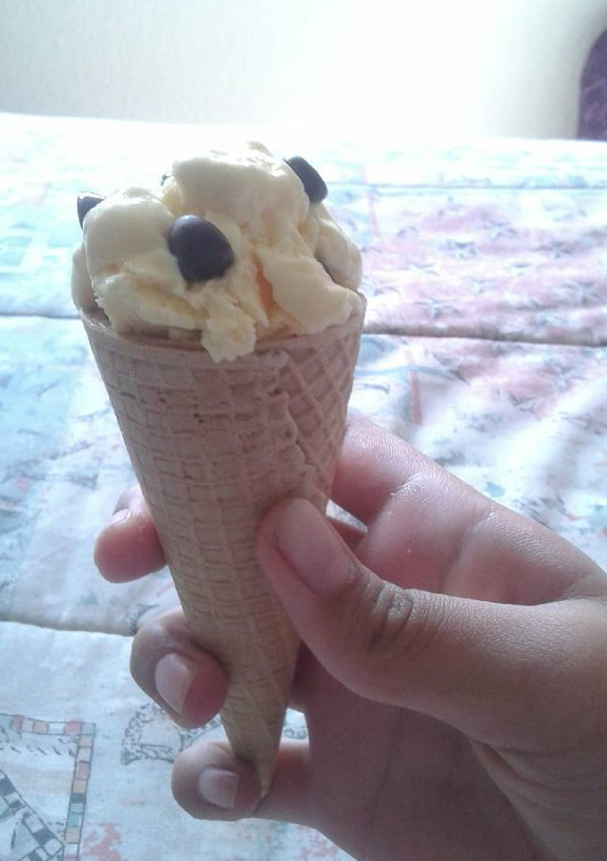 Una foto de Helado de vainilla con chispas de chocolate