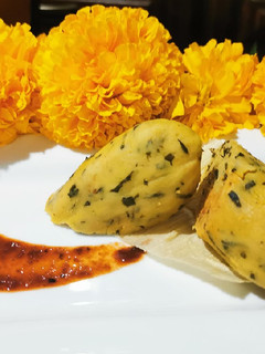Una foto de Tamal de chepil