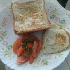 A picture of Toasted bread with eggs.