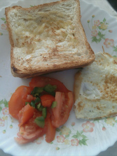 A picture of Toasted bread with eggs.