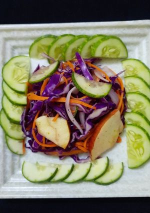 A picture of Purple cabbage, apple summer salad.