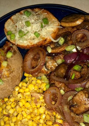 A picture of Fathers Day Steakhouse dinner 🍴 🥩 🥔 🧀 🌽 🍄.