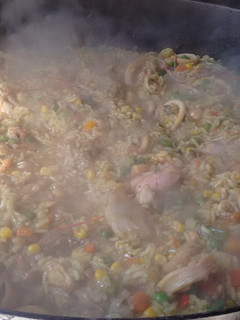 Una foto de Paella al disco