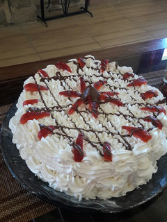 Una foto de Postre de chantilly y frutilla