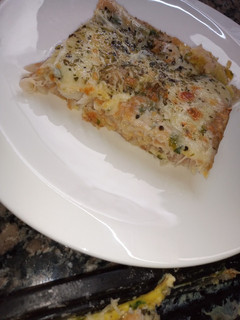 Una foto de Filet de merluza al horno gratinado