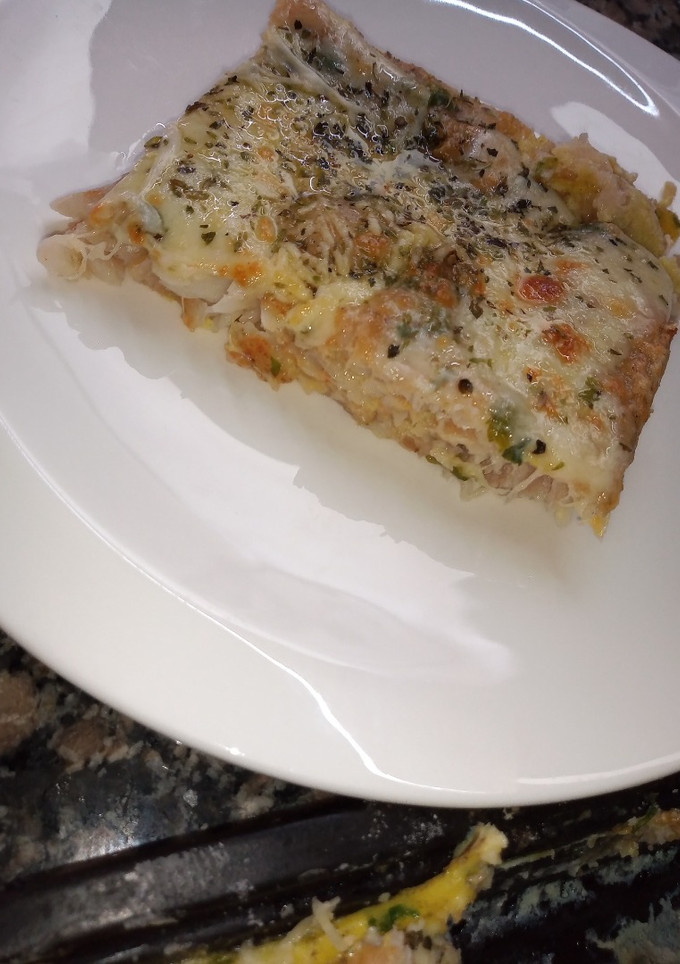 Una foto de Filet de merluza al horno gratinado