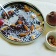 Black rice porridge with fruits and nuts