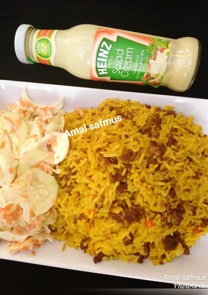 A picture of END OF THE YEAR RECIPE(TUMERIC RICE WITH MINCED MEAT).
