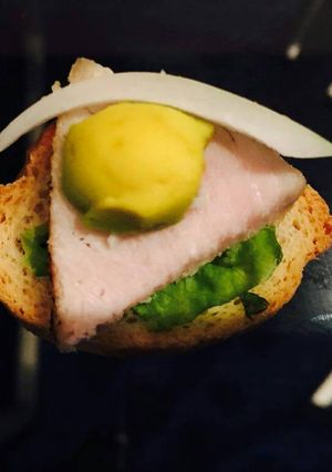 A picture of Bread with ham.
