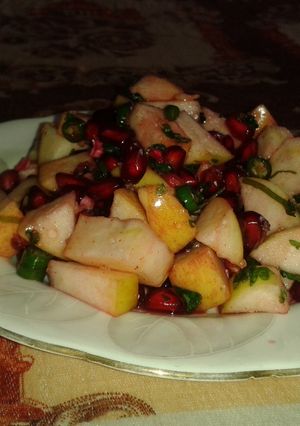 A picture of Peanuts and fruit salad.
