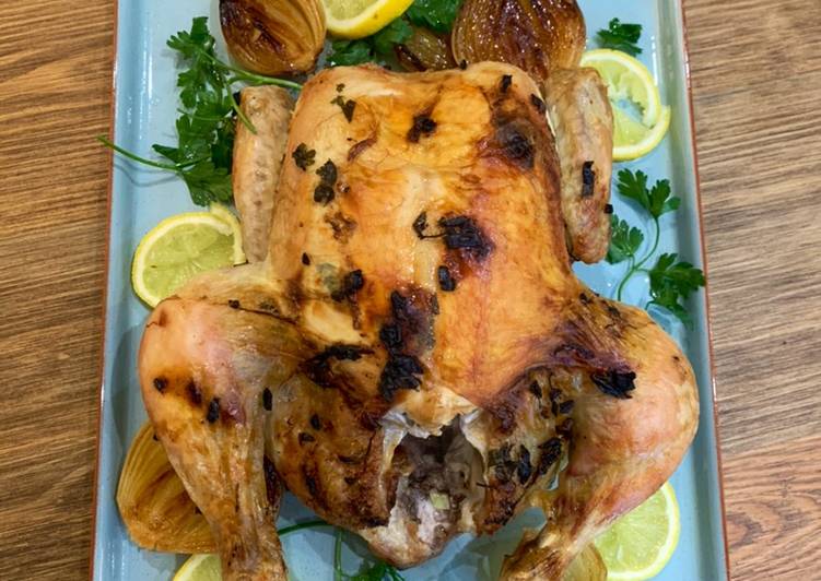 Garlic butter roast chicken with caramelised onions