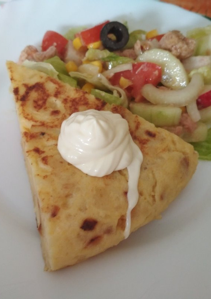 Una foto de Tortilla de Patatas "Y cebolla"