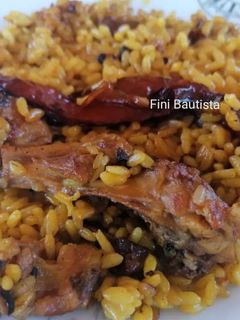 Una foto de Arroz de conejo y pollo de campo